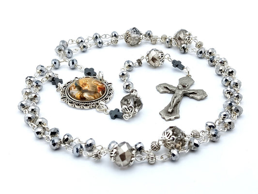 The Annunciation unique rosary beads with faceted crystal beads, pewter crucifix and silver picture centre medal.