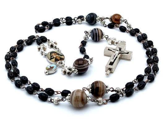 Saint Clare of Assisi unique rosary beads with black nugget glass beads, relic holder crucifix, picture centre medal and brown striped agate gemstone pater beads.