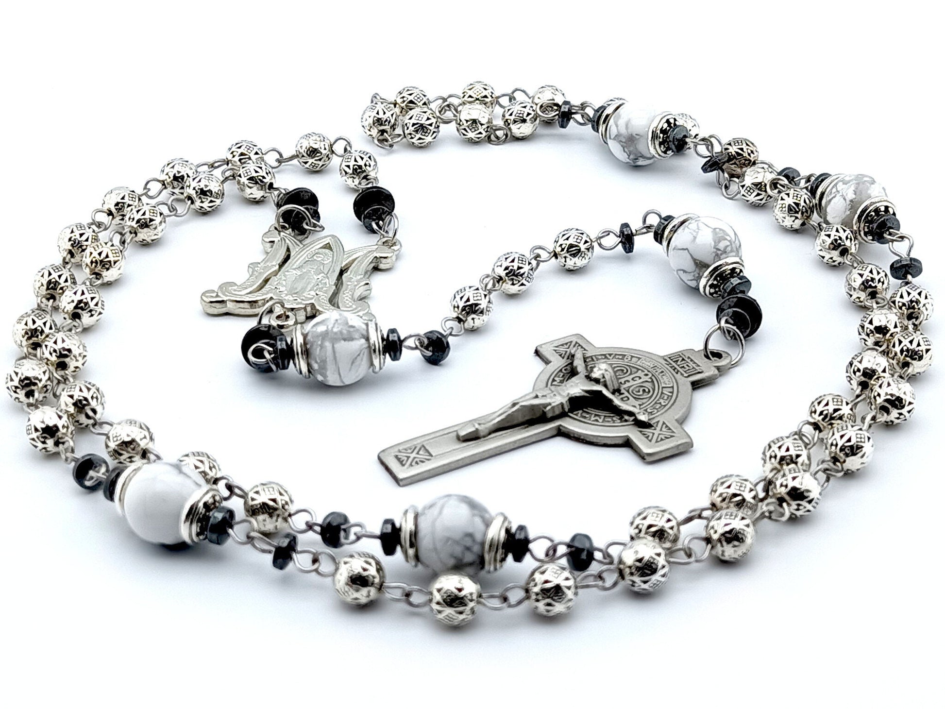 Saint Benedict unique rosary beads with silver metal beads, pewter Saint Benedict crucifix, silver miraculous medal centre and white gemstone pater beads.