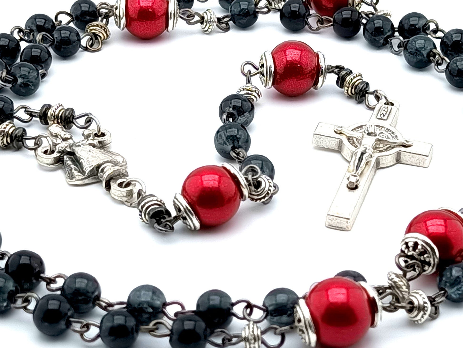 Infant of Prague unique rosary beads with black and red glass beads, silver Saint Benedict crucifix and centre medal.