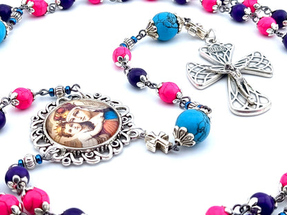 Our Lady Queen of Heaven unique rosary beads with multi coloured gemstone beads, turquoise gemstone pater beads, silver picture centre medal and harlequin crucifix.