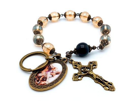 Saint Michael unique rosary beads single decade tenner rosary with pale gold glass and onyx beads, bronze crucifix and picture centre medal.