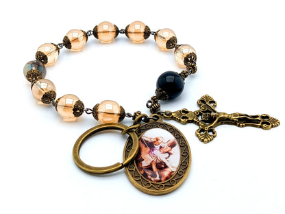 Saint Michael unique rosary beads single decade tenner rosary with pale gold glass and onyx beads, bronze crucifix and picture centre medal.