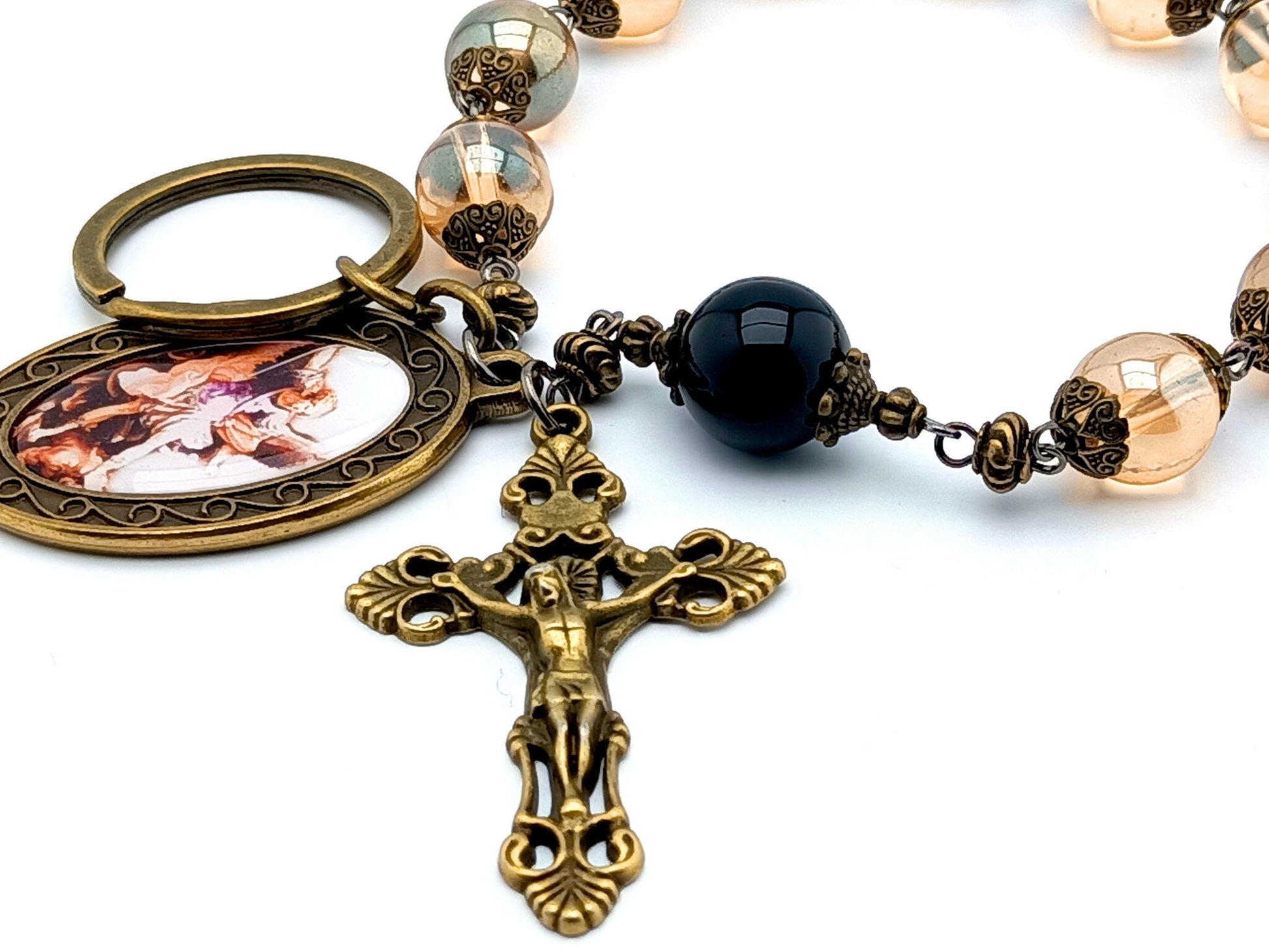 Saint Michael unique rosary beads single decade tenner rosary with pale gold glass and onyx beads, bronze crucifix and picture centre medal.