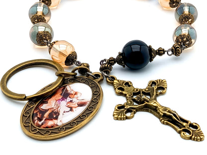 Saint Michael unique rosary beads single decade tenner rosary with pale gold glass and onyx beads, bronze crucifix and picture centre medal.