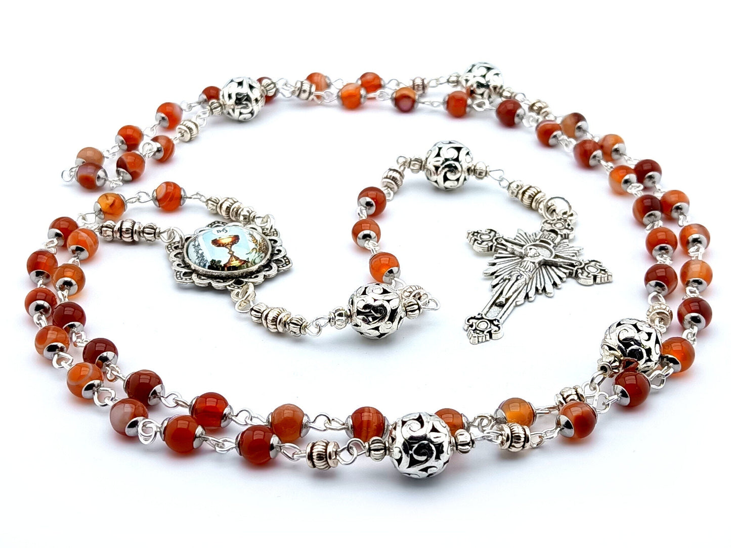 First Holy Communion unique rosary beads with red agate gemstone beads, silver pater beads, silver sunburst crucifix and picture centre medal.