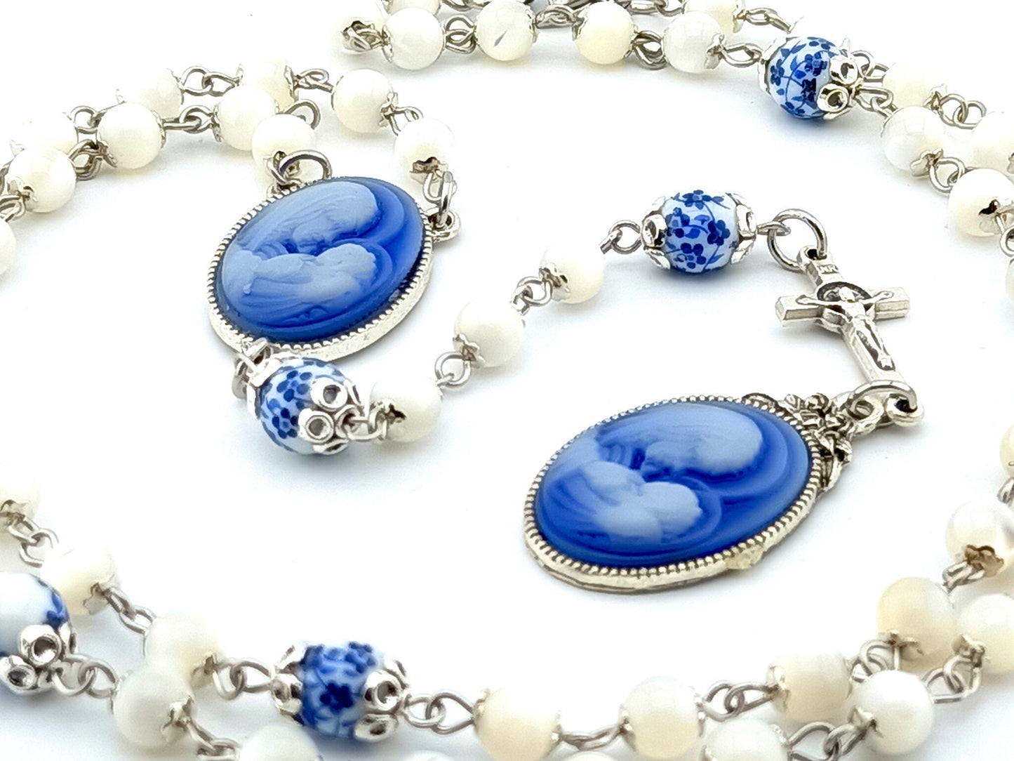 Virgin Mary and Child unique rosary beads with mother of pearl and porcelain beads, silver small linking crucifix, blue and white cameo centre medal and end medal.