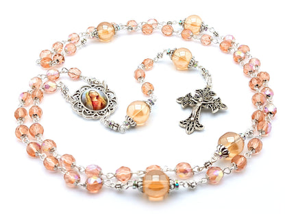 Virgin Mary unique rosary beads with rose gold faceted glass beads, silver filigree crucifix and picture centre medal.