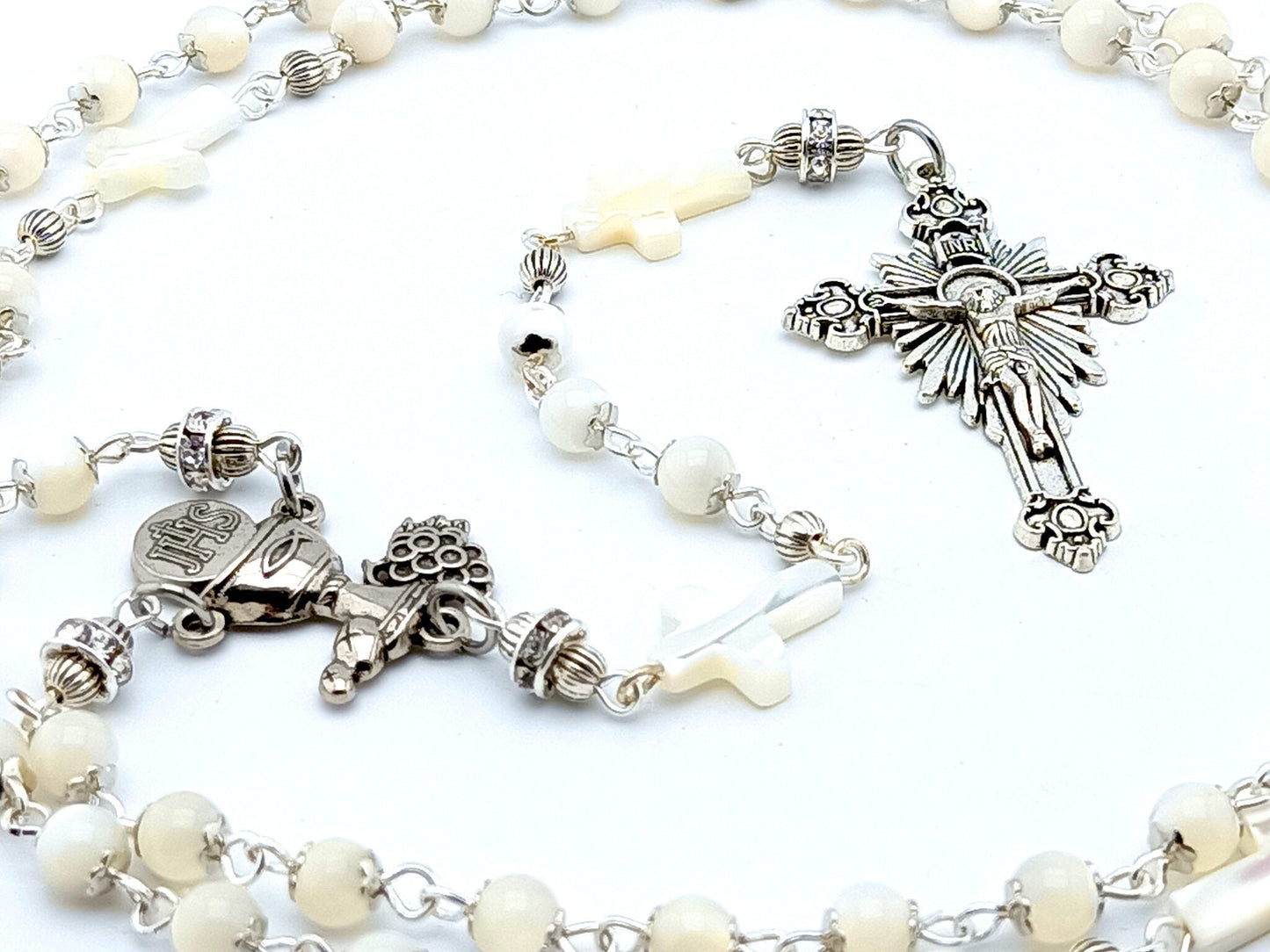 First Holy Communion unique rosary beads with mother of pearl beads and silver crucifix and centre medal. 