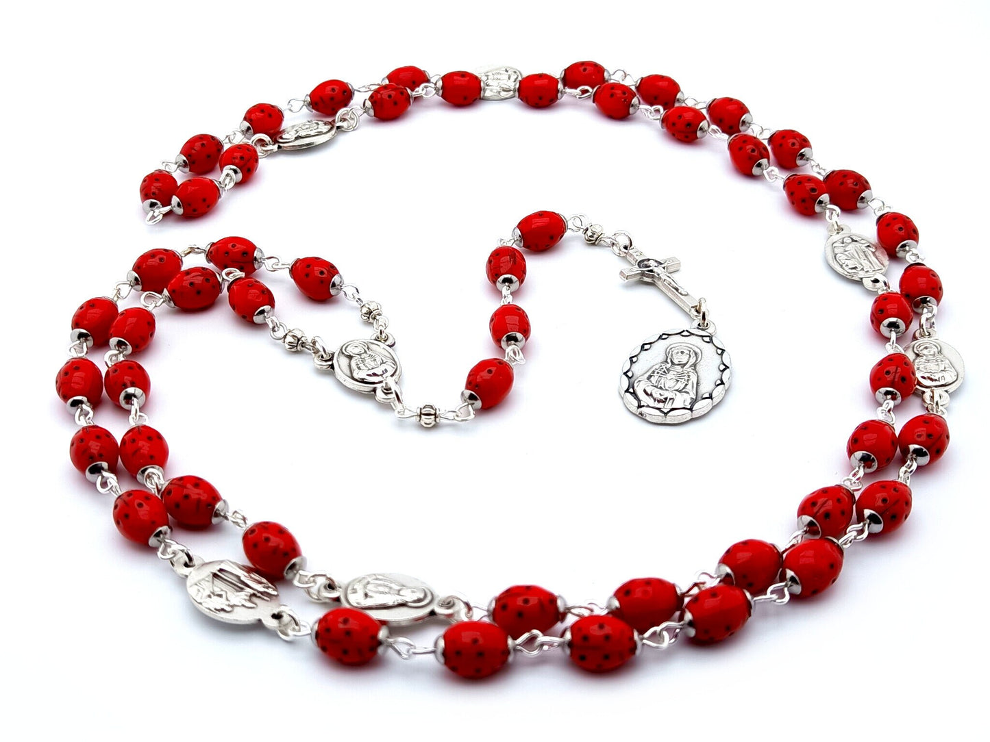 Our Lady of Sorrows unique rosary beads dolor rosary with red lady bug beads, silver Saint Benedict crucifix and medals.