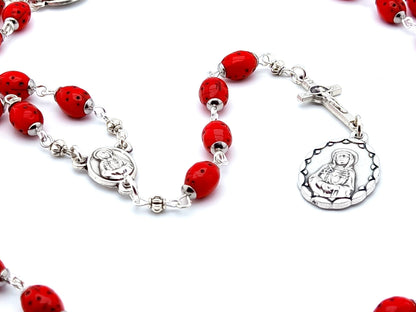 Our Lady of Sorrows unique rosary beads dolor rosary with red lady bug beads, silver Saint Benedict crucifix and medals.