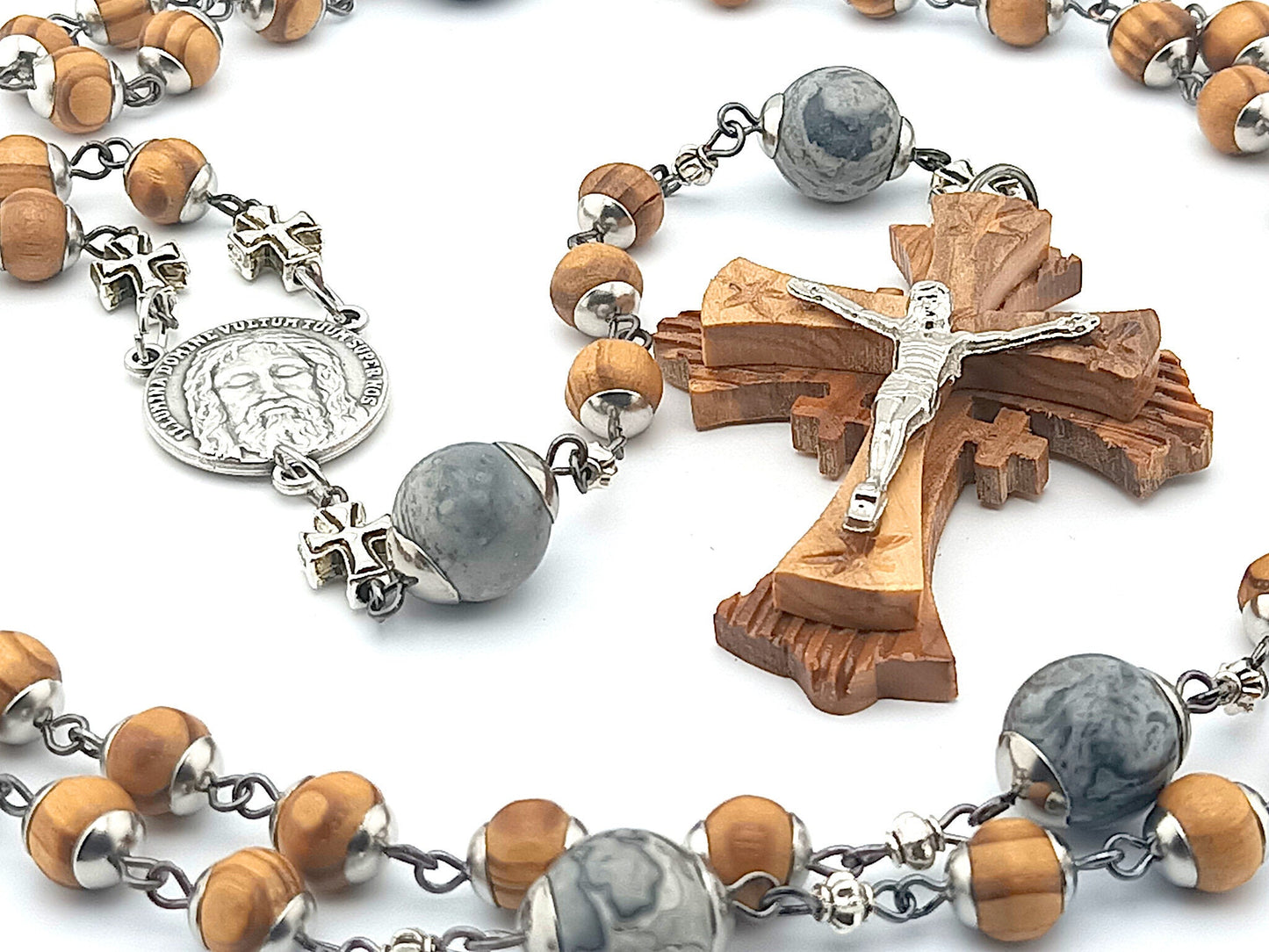 Holy Face of Jesus unique rosary beads with wooden beads and crucifix, stainless steel bead caps, and silver cross beads.