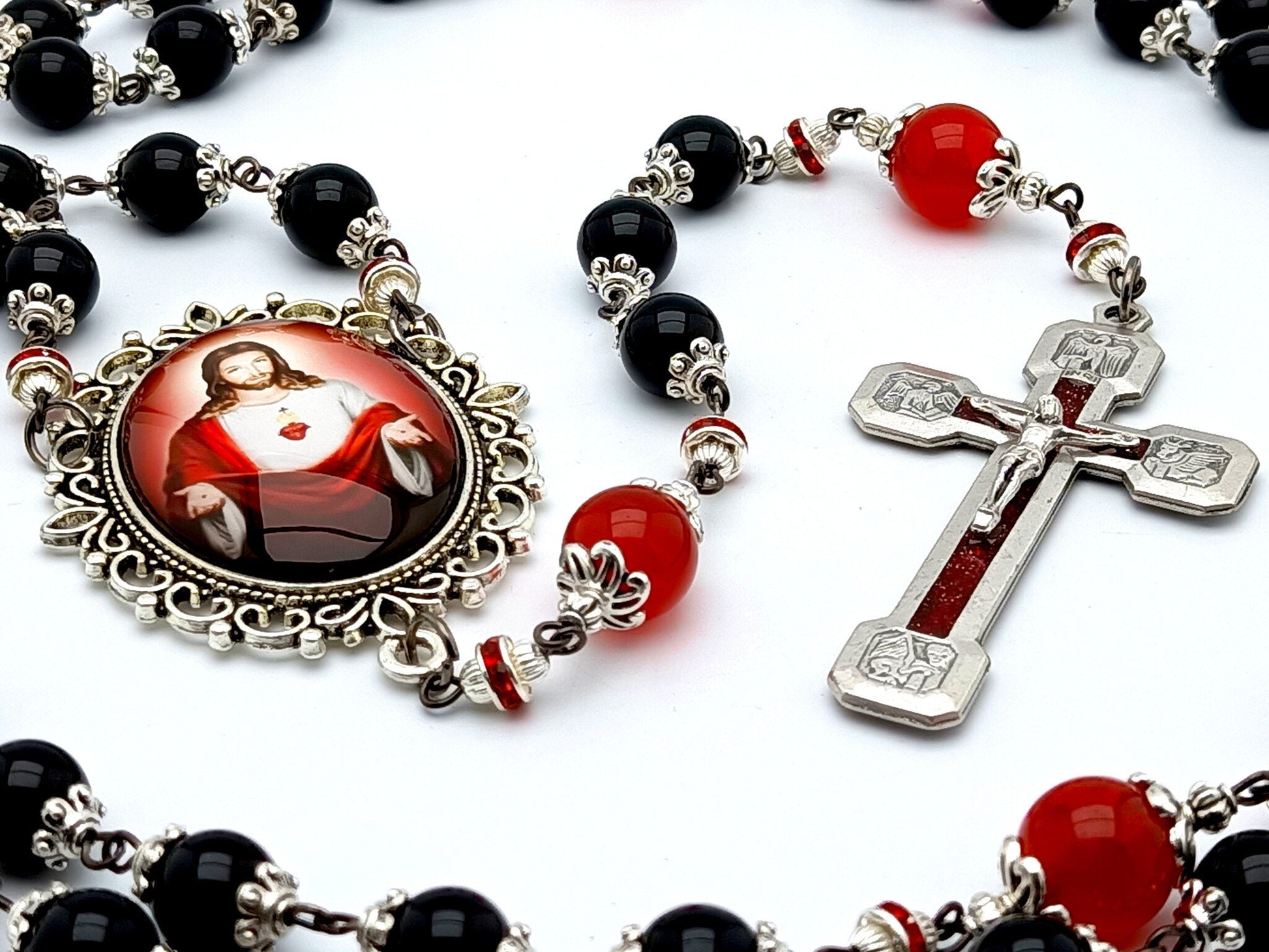 Sacred Heart unique rosary beads with black onyx and red gemstone beads, red enamel crucifix and large picture centre medal.