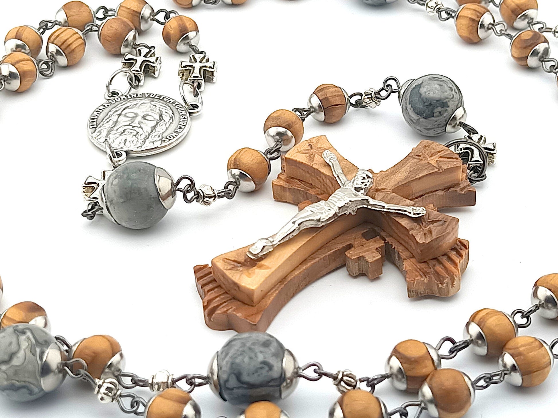 Holy Face of Jesus unique rosary beads with wooden beads and crucifix, stainless steel bead caps, and silver cross beads.