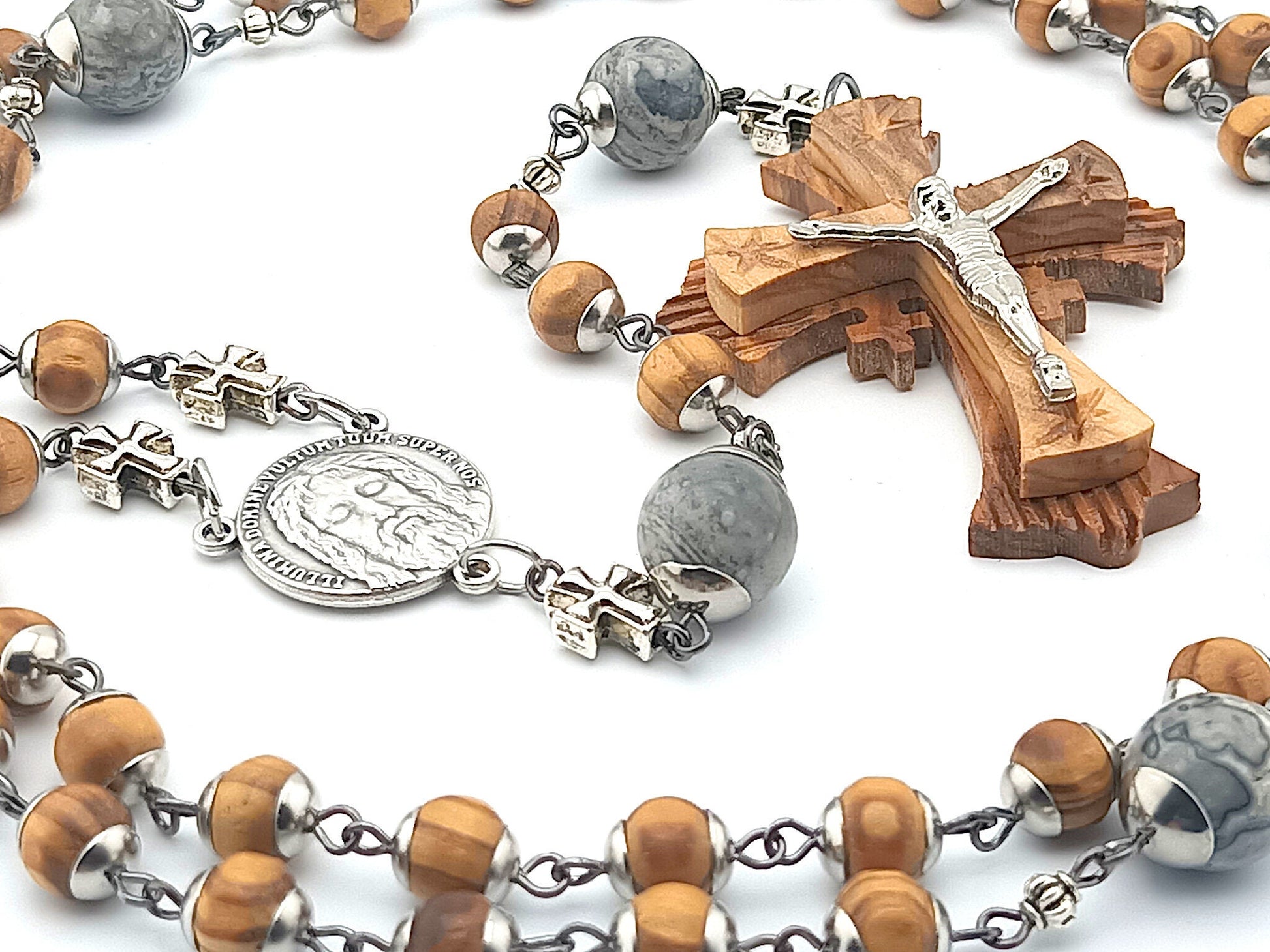Holy Face of Jesus unique rosary beads with wooden beads and crucifix, stainless steel bead caps, and silver cross beads.
