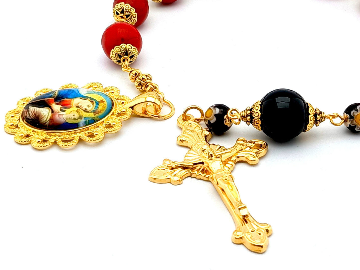 Our Lady of Perpetual Help unique rosary beads single decade rosary with red gemstone and onyx beads, golden sunburst crucifix and picture end medal.