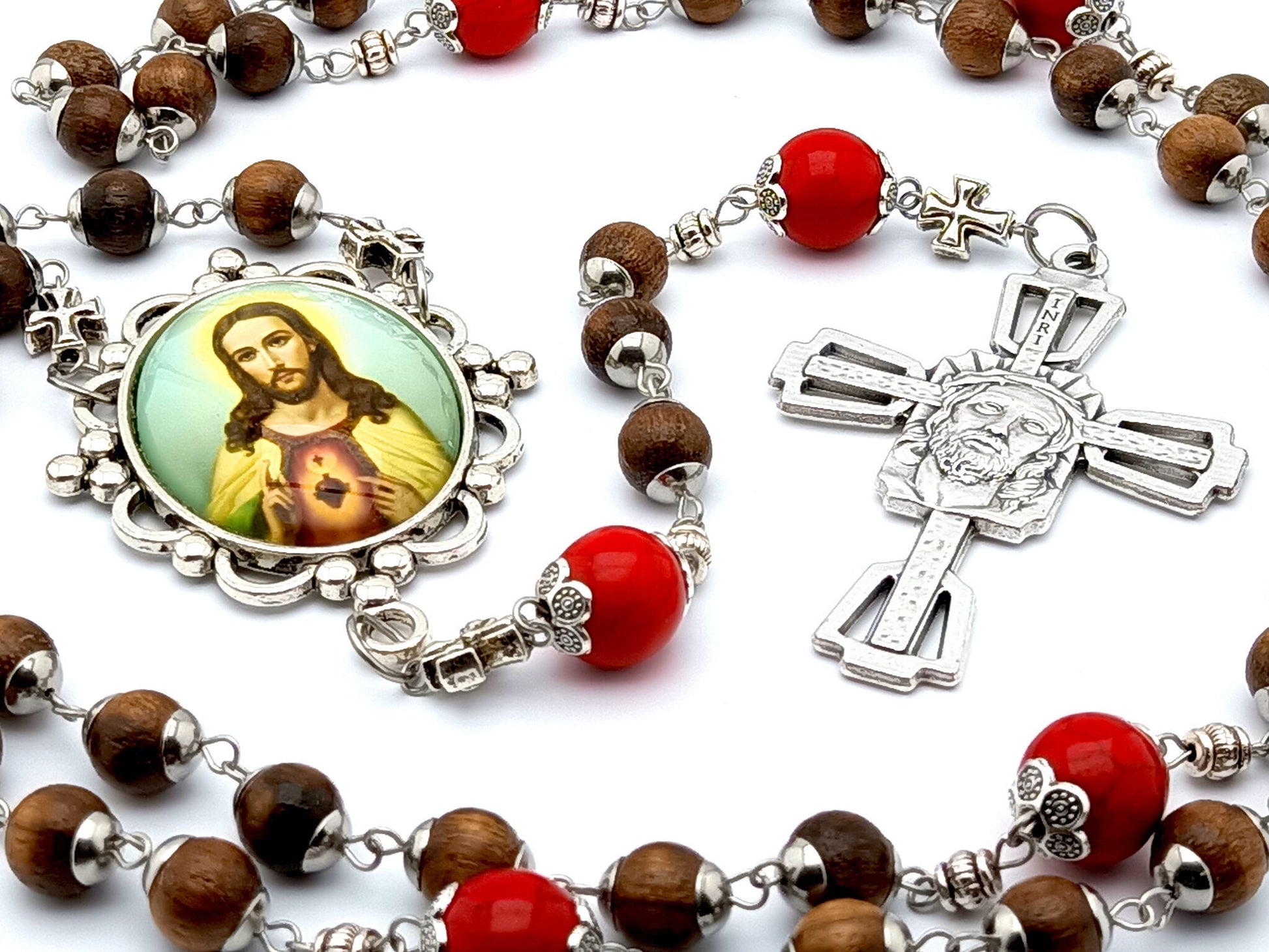 Sacred Heart unique rosary beads with dark wood and red gemstone beads, silver Holy Face crucifix and picture centre medal.