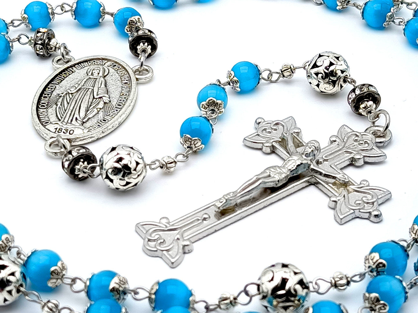 Miraculous Medal unique rosary beads with blue glass and silver beads, large silver plated crucifix, centre medal and silver diamonte accessories.