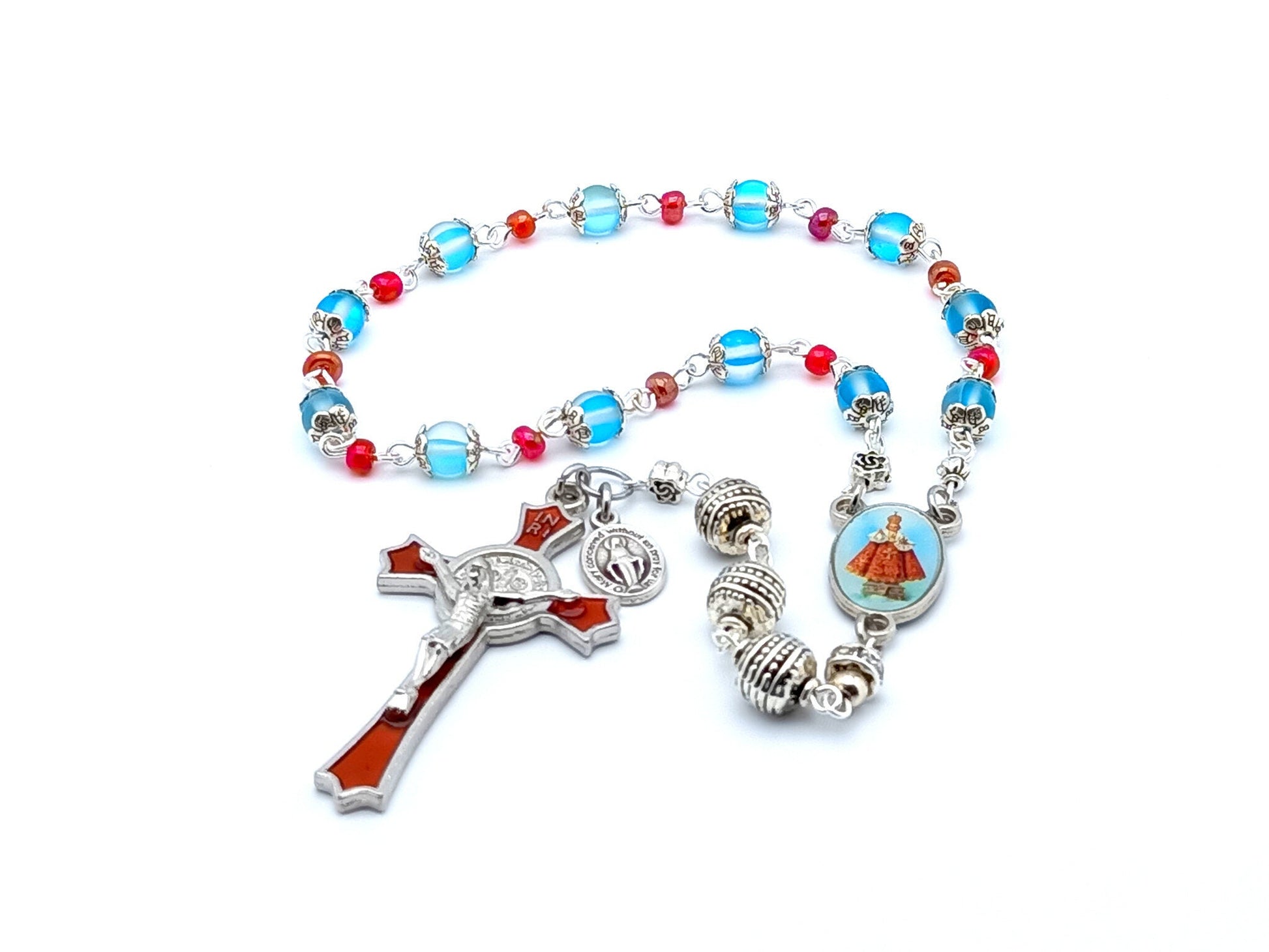 Infant of Prague unique rosary beads prayer chaplet with blue quartz gemstone beads, red enamel crucifix and silver picture centre medal.