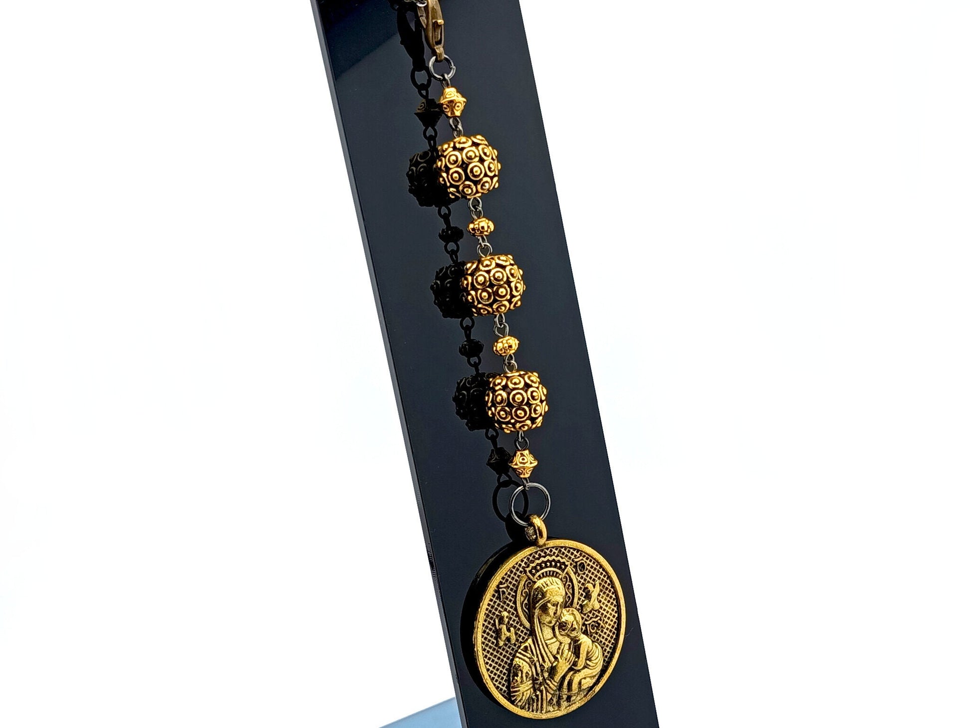 Our Lady of Succor unique rosary beads three Hail Marys purse clip with golden beads, medal and clip.