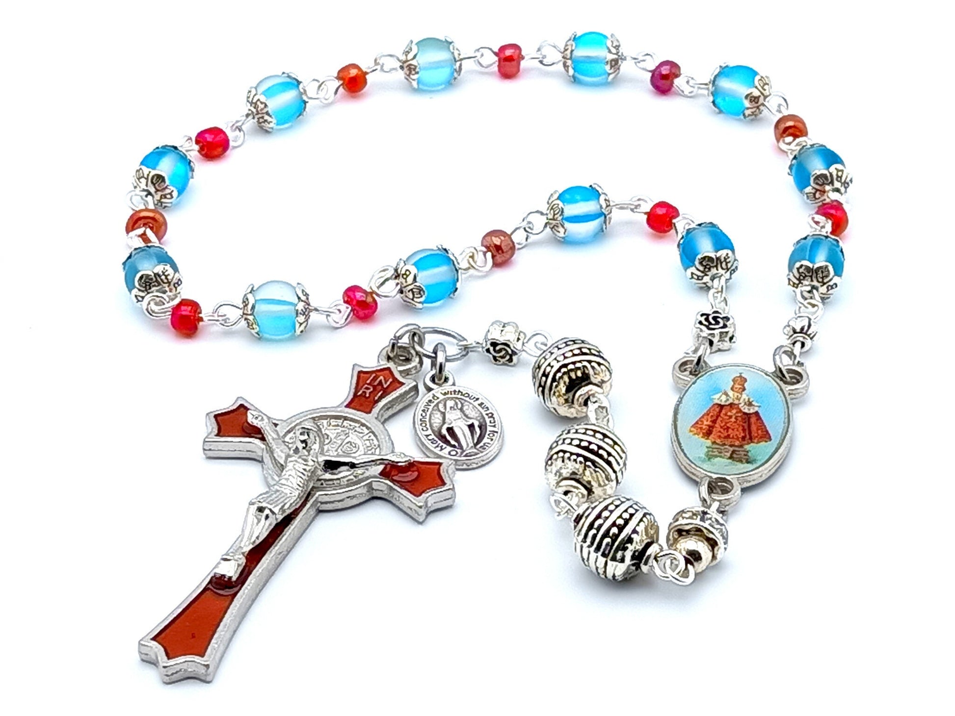 Infant of Prague unique rosary beads prayer chaplet with blue quartz gemstone beads, red enamel crucifix and silver picture centre medal.