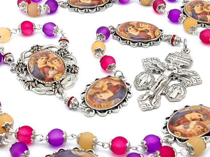 Our Lady of Perpetual Help unique rosary beads with multi coloured glass beads, silver pardon crucifix and picture centre medal.