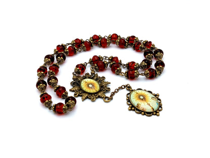 Blessed Sacrament unique rosary beads prayer chaplet with red nugget glass beads, bronze picture centre and end medals.