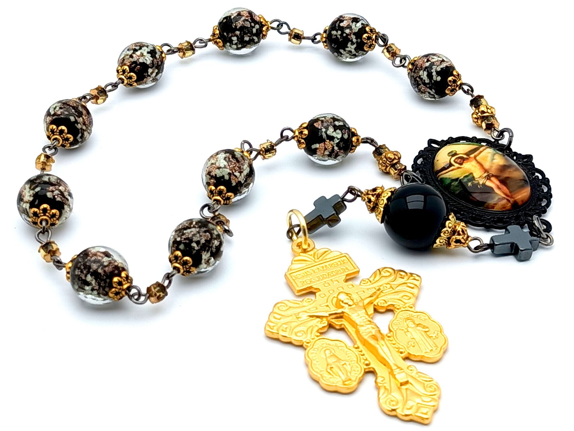 Crucifixion unique rosary beads single decade rosary with black and gold glow in the dark glass beads, golden pardon crucifix and picture centre medal.