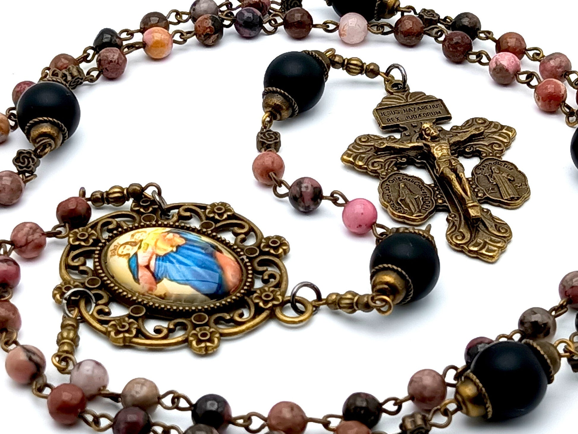 Our Lady help of Christians unique rosary beads with rhodonite and matt onyx gemstone beads, brass pardon crucifix and picture centre medal.