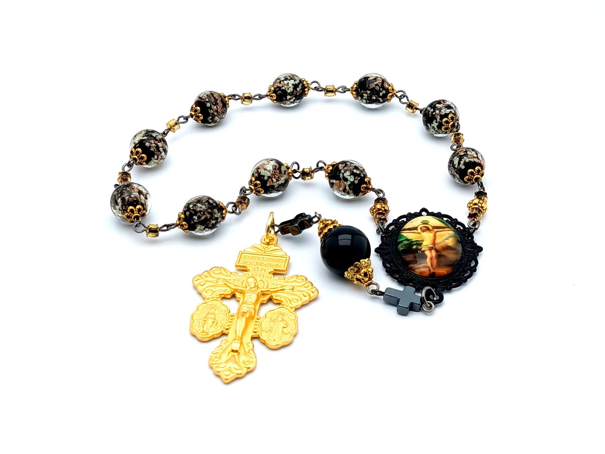 Crucifixion unique rosary beads single decade rosary with black and gold glow in the dark glass beads, golden pardon crucifix and picture centre medal.