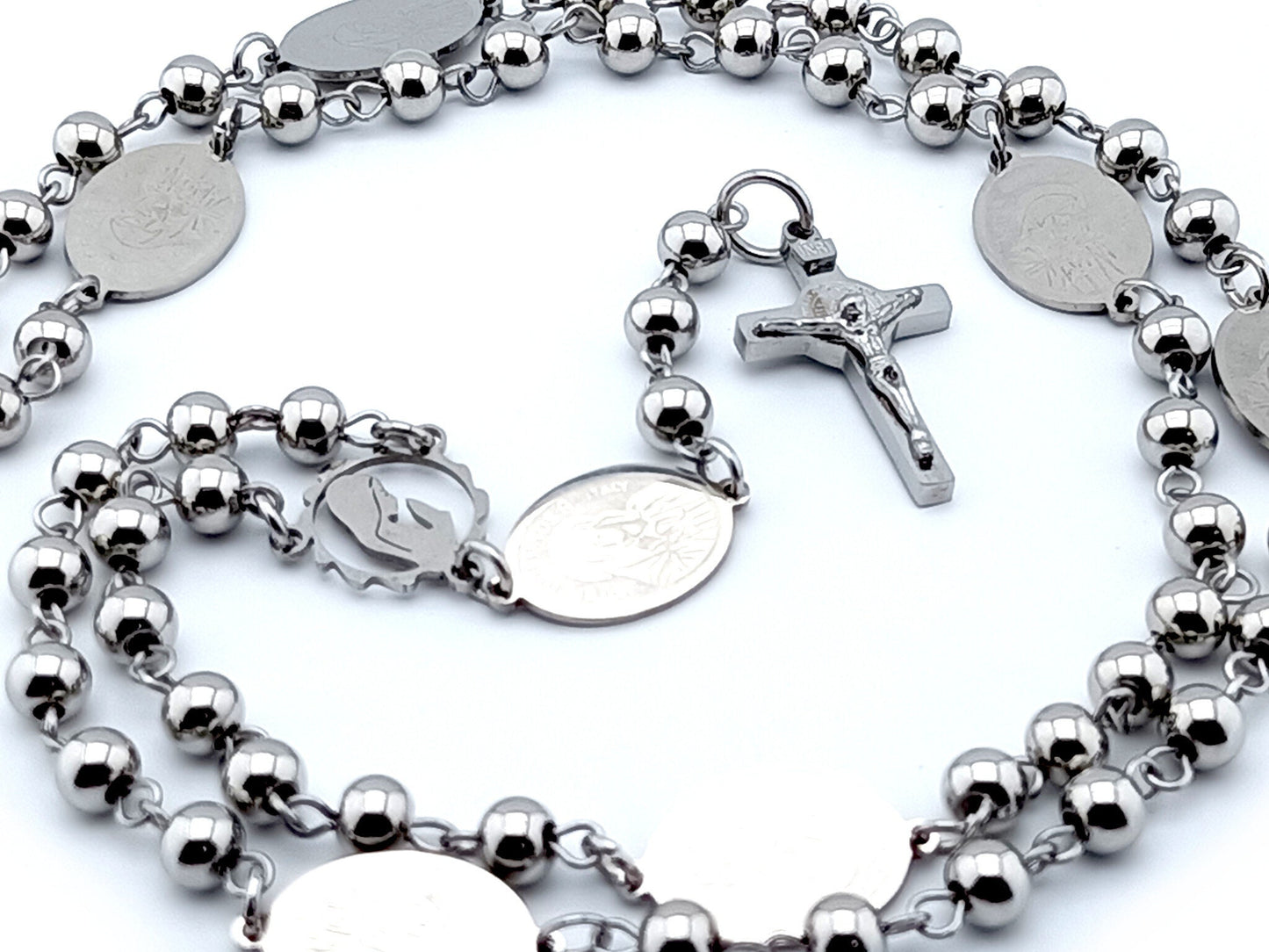 Our Lady of Sorrows unique rosary beads with stainless steel beads, wire , laser cut centre medal, crucifix and medals.