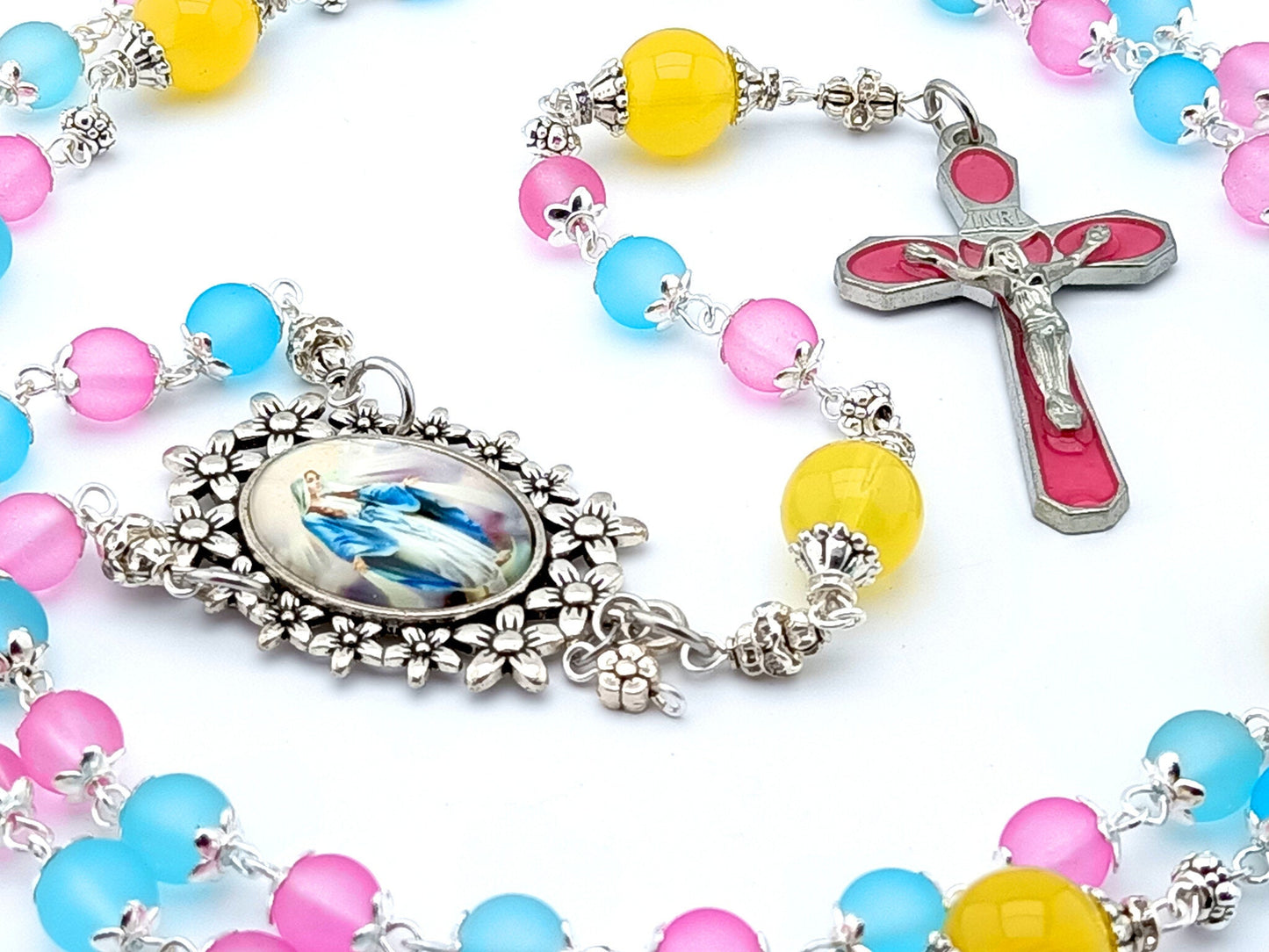 Immaculate Conception unique rosary beads with mixed colour glass beads, pink enamel crucifix and silver picture centre medal and accessories.