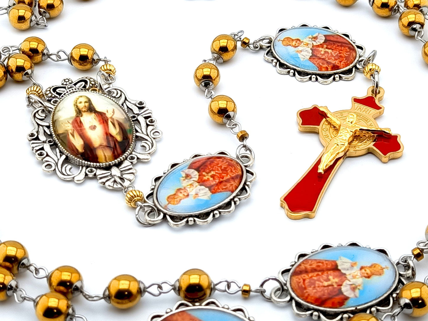 Infant of Prague unique rosary beads with gold hematite gemstone beads, Infant of Prague pater beads, gold and red enamel crucifix and silver picture centre medal.