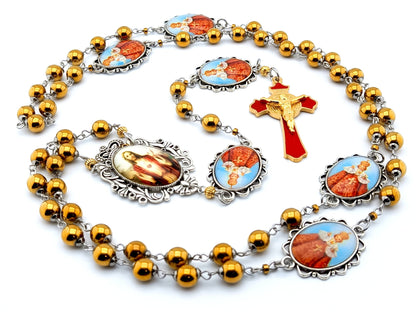 Infant of Prague unique rosary beads with gold hematite gemstone beads, Infant of Prague pater beads, gold and red enamel crucifix and silver picture centre medal.