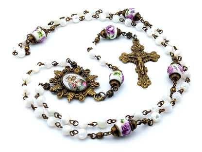 Our Lady of Perpetual Succour unique rosary beads with mother of pearl and porcelain beads, bronze crucifix, picture centre medal and accessories.