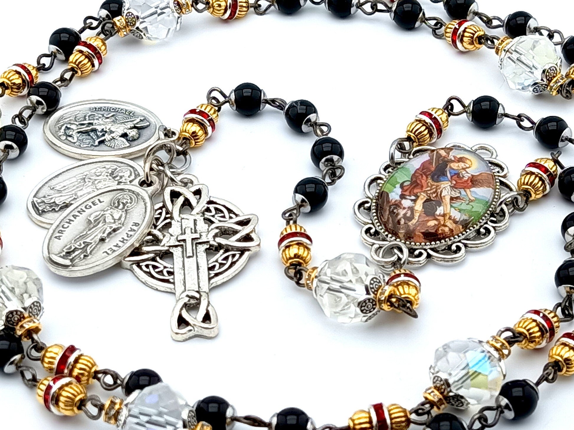 Saint Michael unique rosary beads prayer chaplet with black and clear glass beads, silver angel medals and picture centre medal and crucifix.