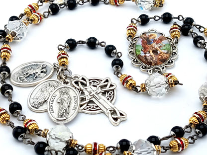 Saint Michael unique rosary beads prayer chaplet with black and clear glass beads, silver angel medals and picture centre medal and crucifix.