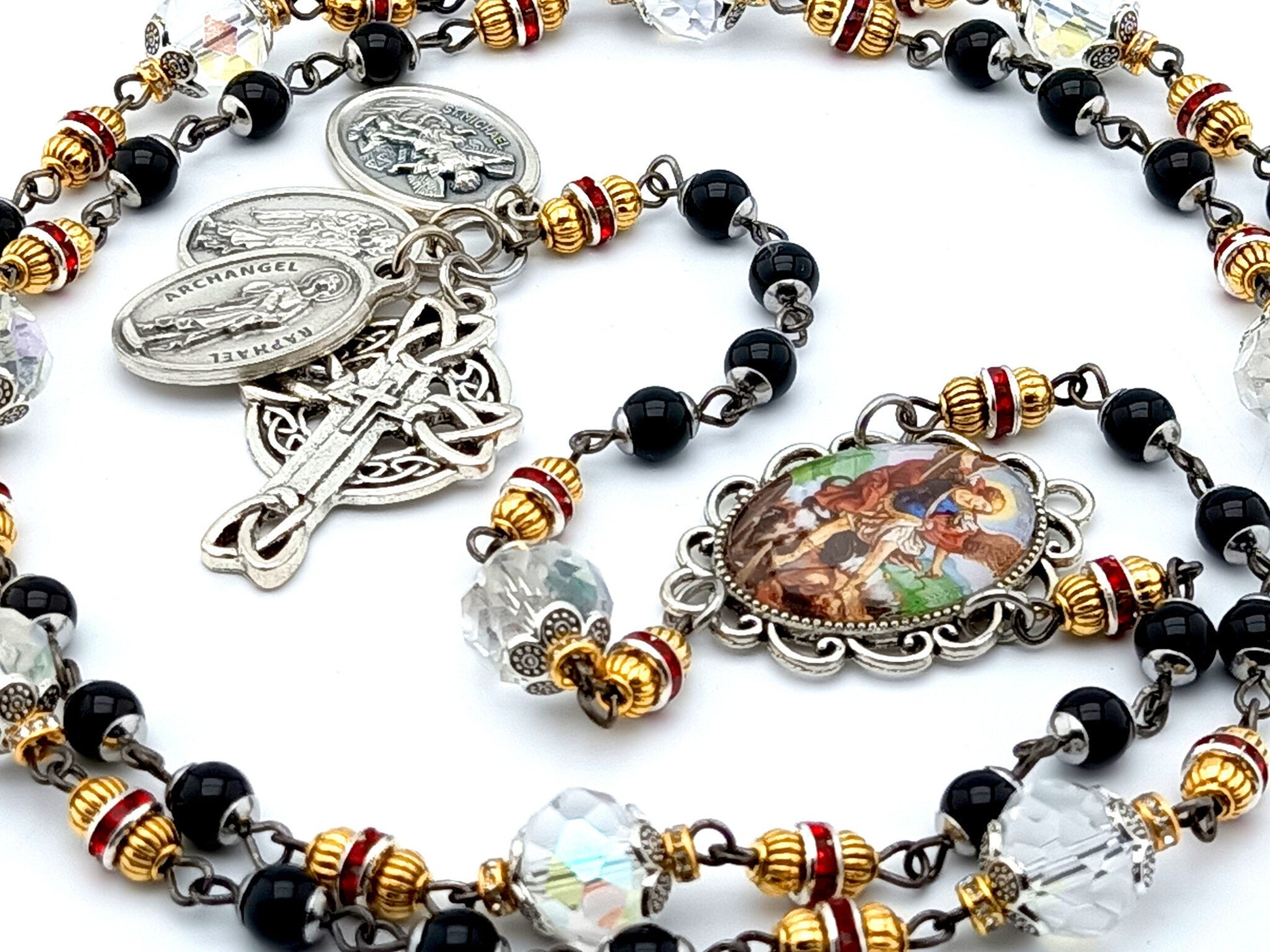 Saint Michael unique rosary beads prayer chaplet with black and clear glass beads, silver angel medals and picture centre medal and crucifix.