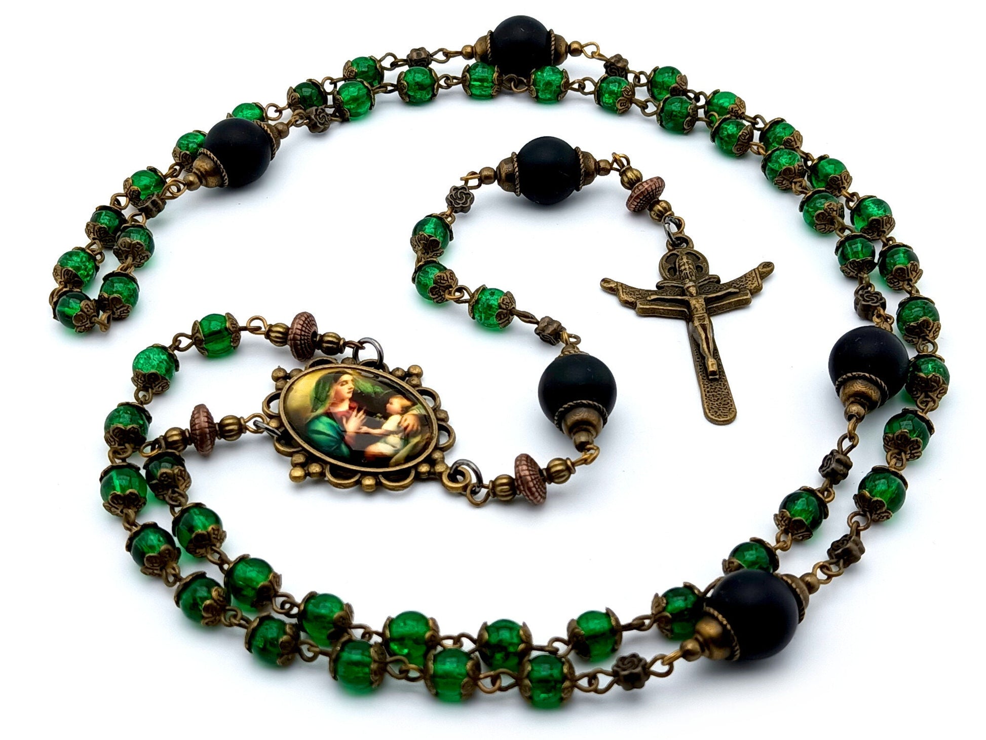 Virgin Mother and child unique rosary beads with green glass and black matt onyx beads, bronze crucifix and picture centre medal.