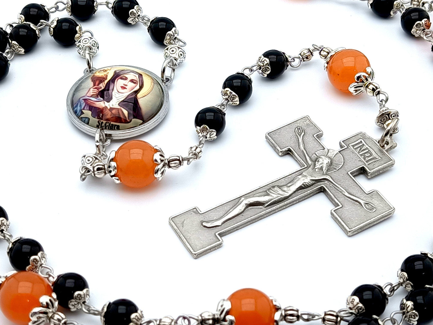 Saint Clare unique rosary beads with black onyx and tangerine gemstone beads, silver crucifix and picture centre medal.