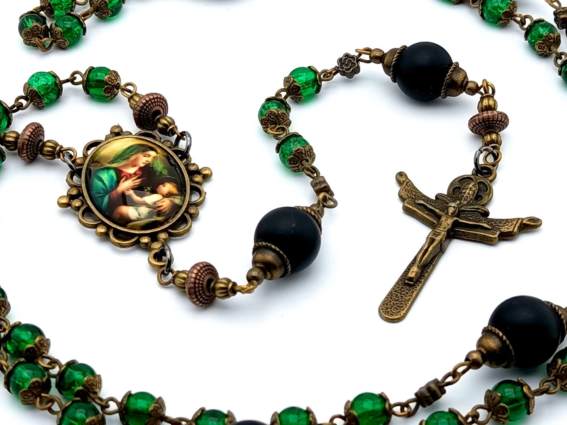 Virgin Mother and child unique rosary beads with green glass and black matt onyx beads, bronze crucifix and picture centre medal.