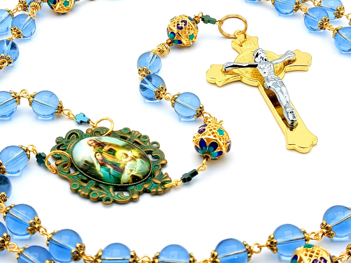 Holy Family unique rosary beads with blue glass and filigree gold beads, golden Saint Benedict crucifix and aged verdigris picture centre medal.