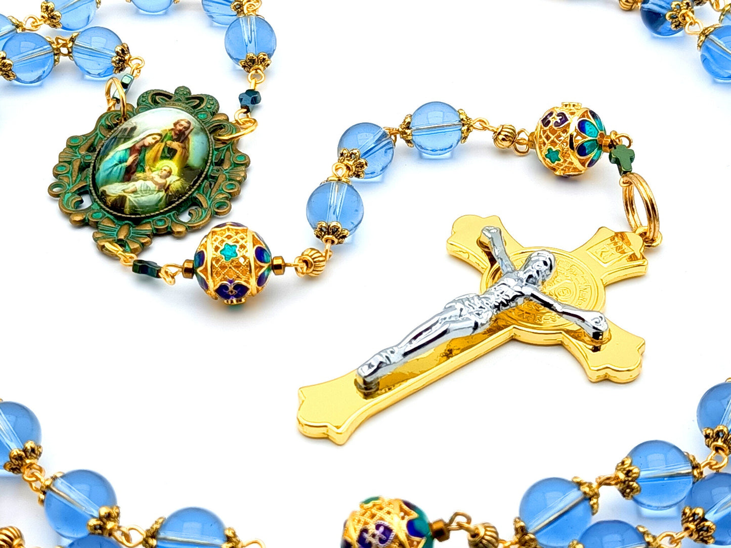 Holy Family unique rosary beads with blue glass and filigree gold beads, golden Saint Benedict crucifix and aged verdigris picture centre medal.