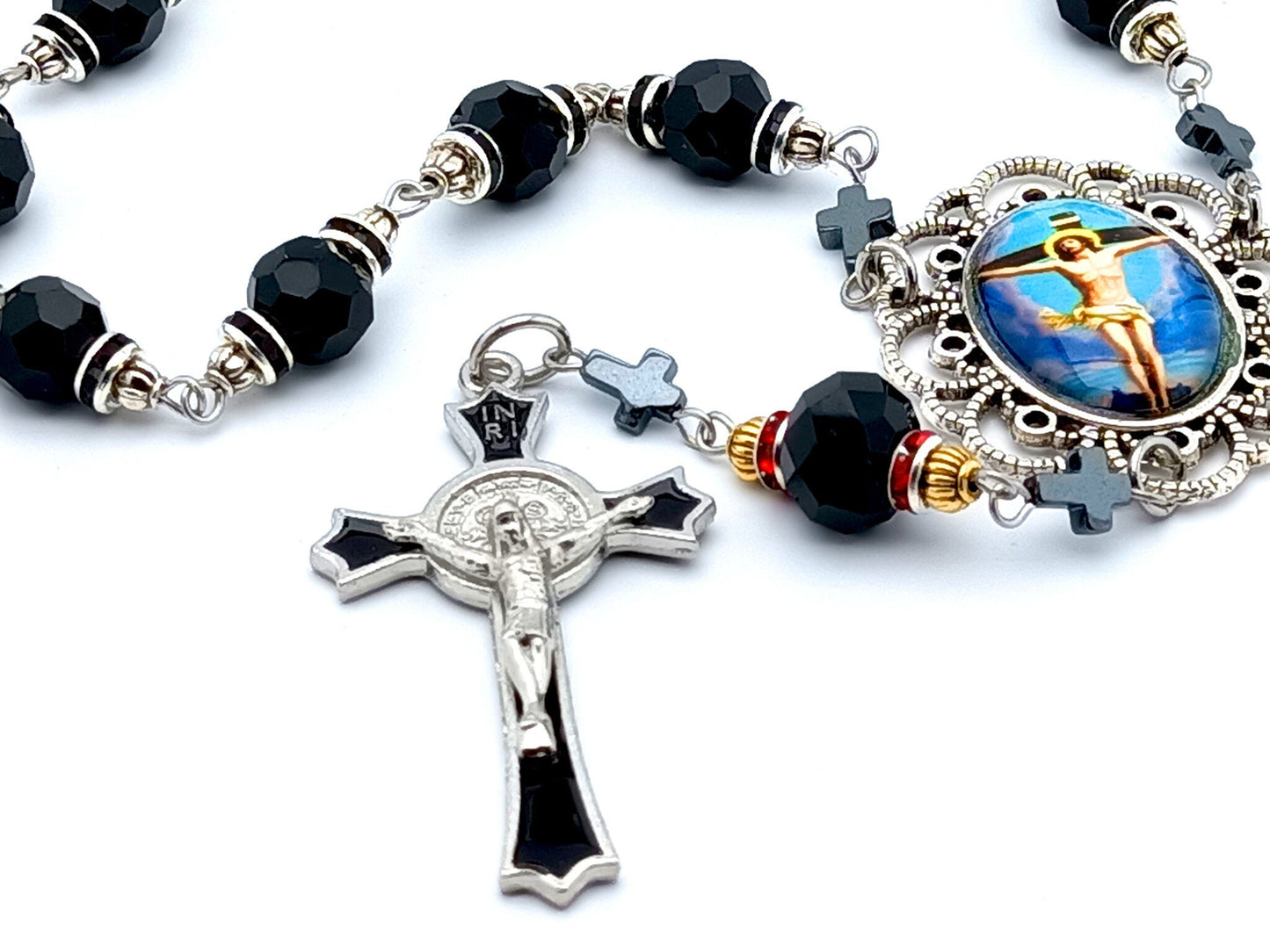 The Crucifixion unique rosary beads single decade rosary with black faceted glass beads, black enamel crucifix and silver picture centre medal.