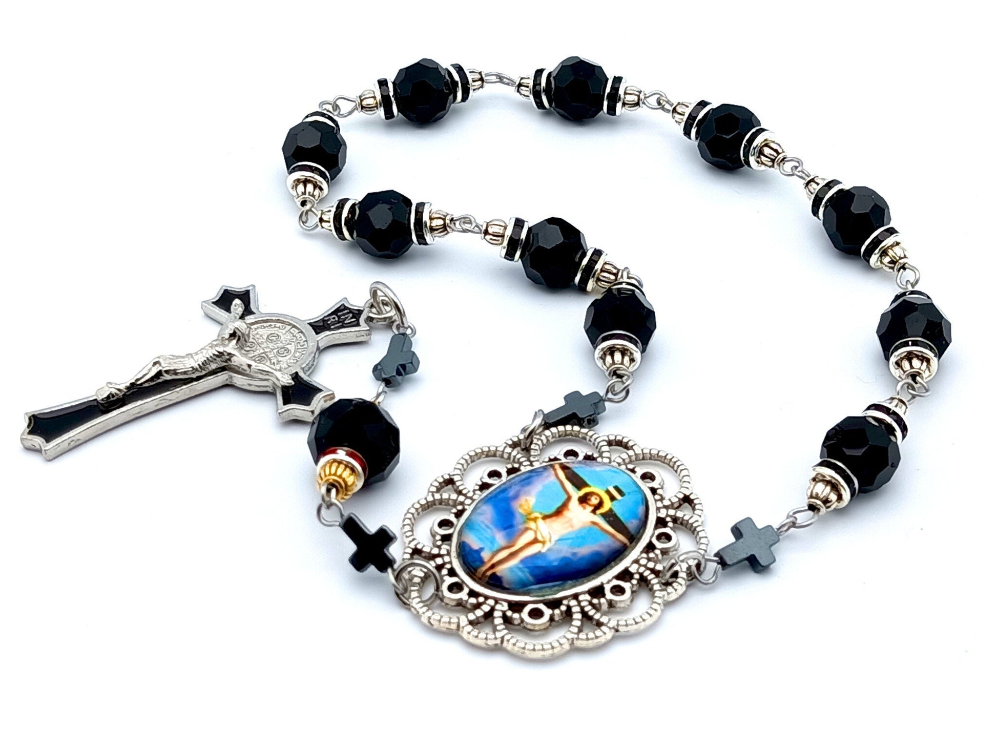 The Crucifixion unique rosary beads single decade rosary with black faceted glass beads, black enamel crucifix and silver picture centre medal.