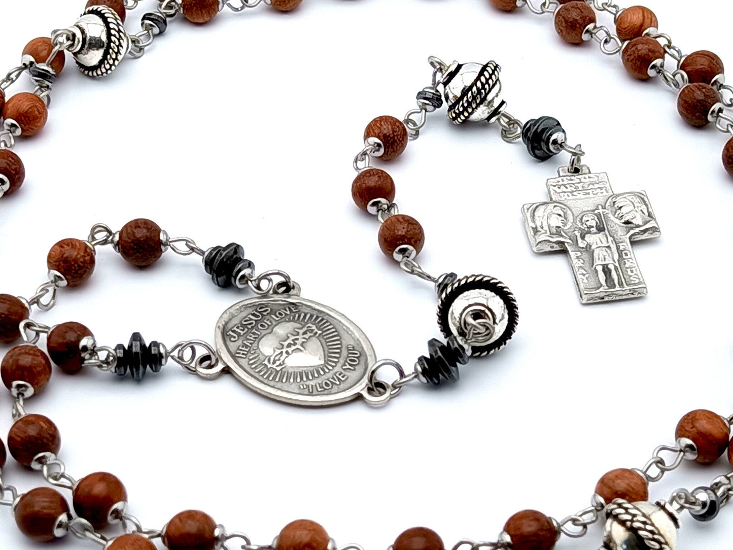 Sacred Heart unique rosaryt beads with dark wood and silver beads, silver Holy Family cross and Sacred Heart centre medal.