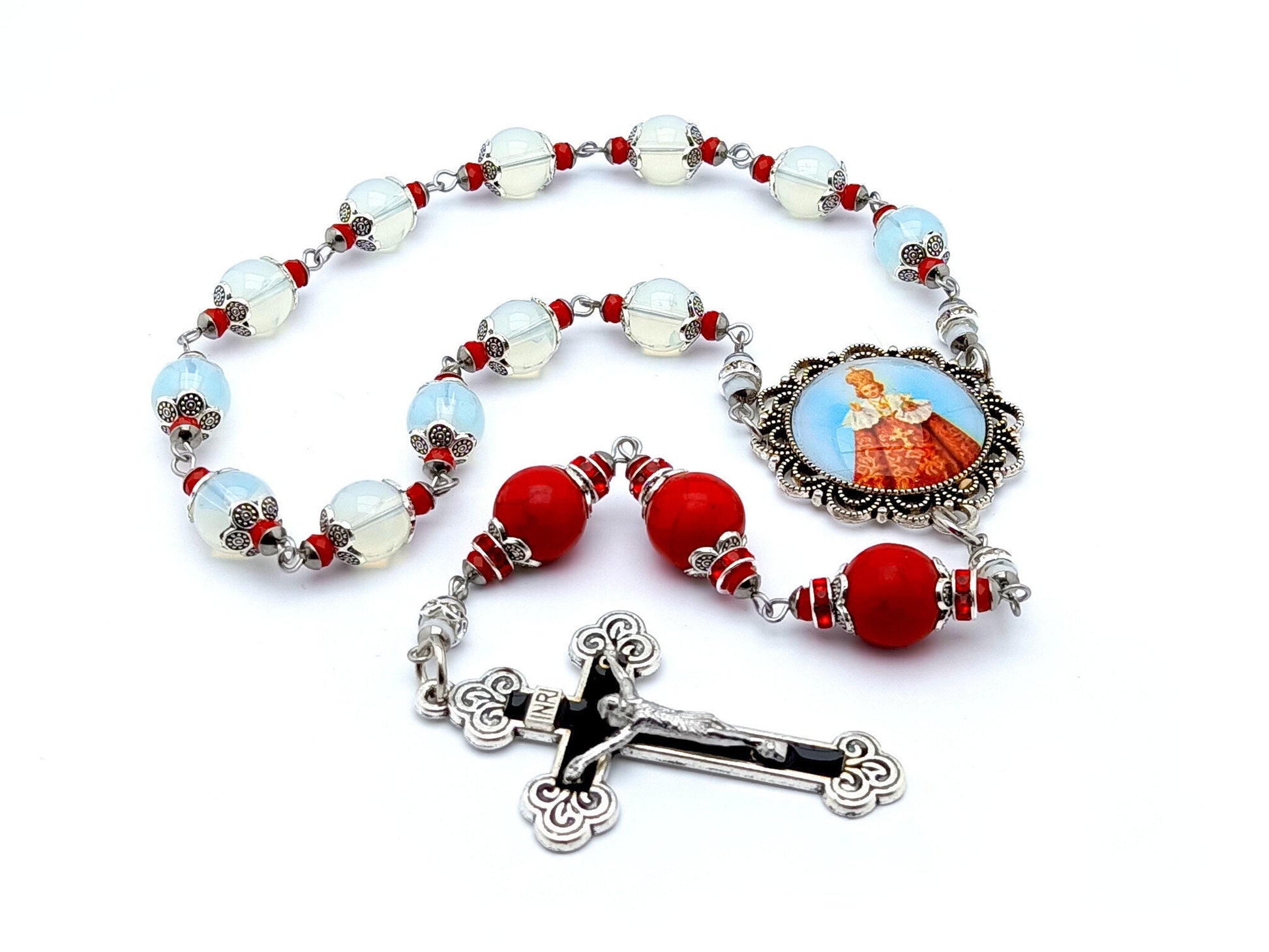 Infant of Prague unique rosary beads prayer chaplet with opal and red gemstone beads, black and silver enamel crucifix and picture centre medal.