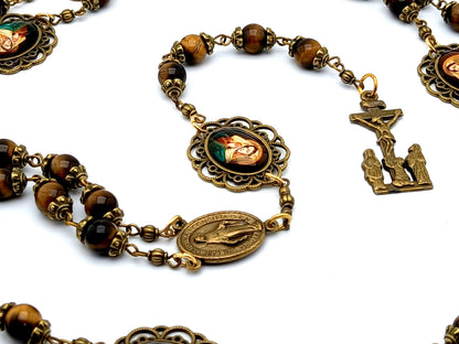 Our Lady of Sorrows unique rosary beads dolor rosary with tigers eye gemstone beads, bronze crucifix, picture medals and centre medal.