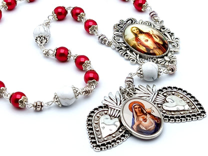 Two Hearts of Jesus and Mary unique rosary beads prayer chaplet with red and white beads, silver two heart medals and picture medals.