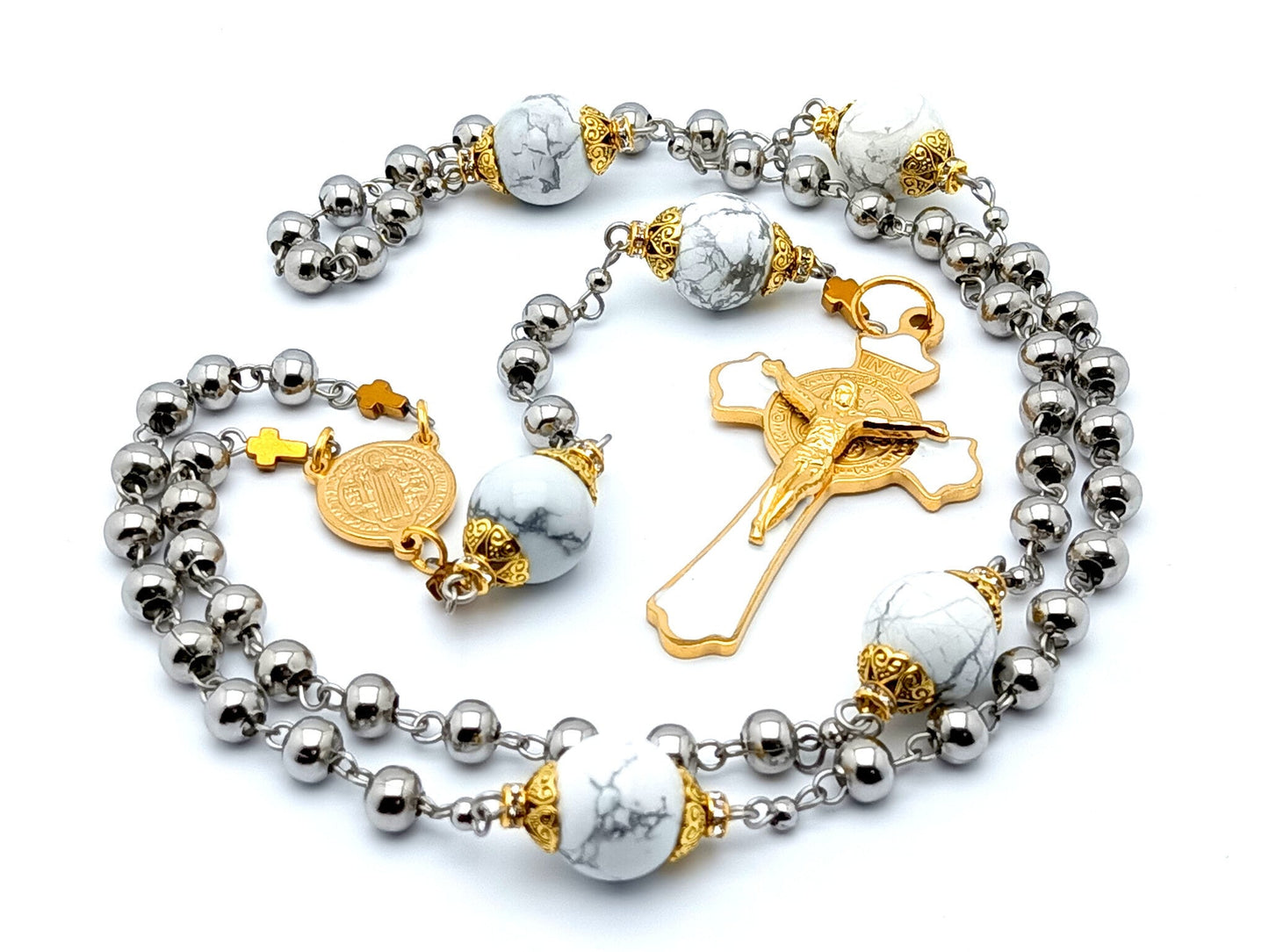 Saint Benedict unique rosary beads with stainless steel and white beads, stainless steel gold plated and white enamel crucifix and gold plated stainless steel centre medal.